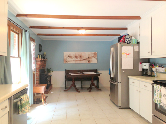 With the magic of paint we transformed it into a whimsical blue kitchen!