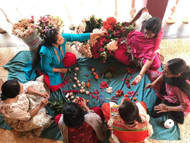The women made beautiful floral garlands for the wedding ceremony.